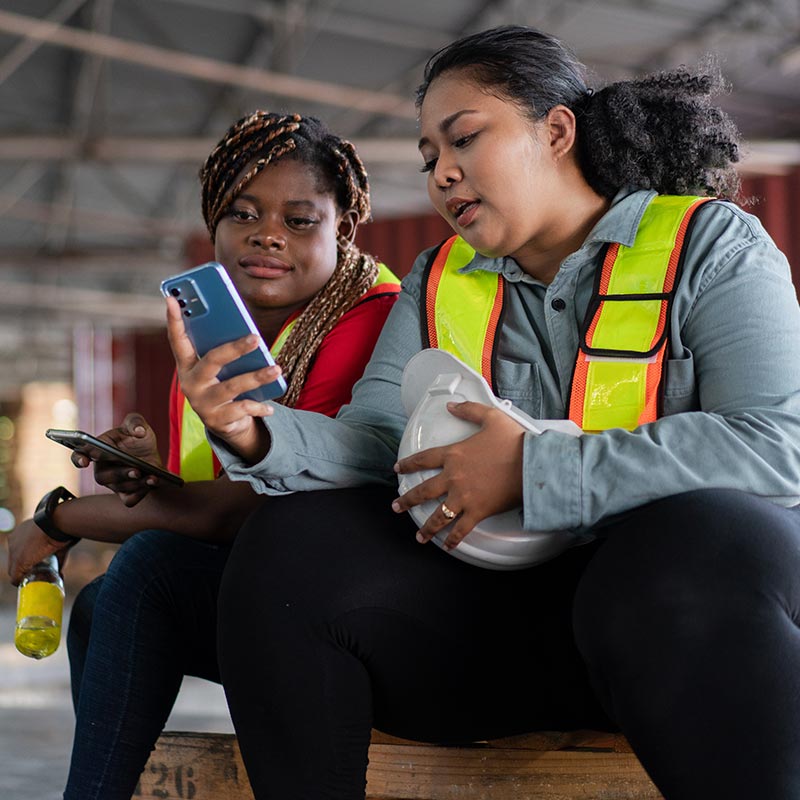 Volunteers using mobile devices for training